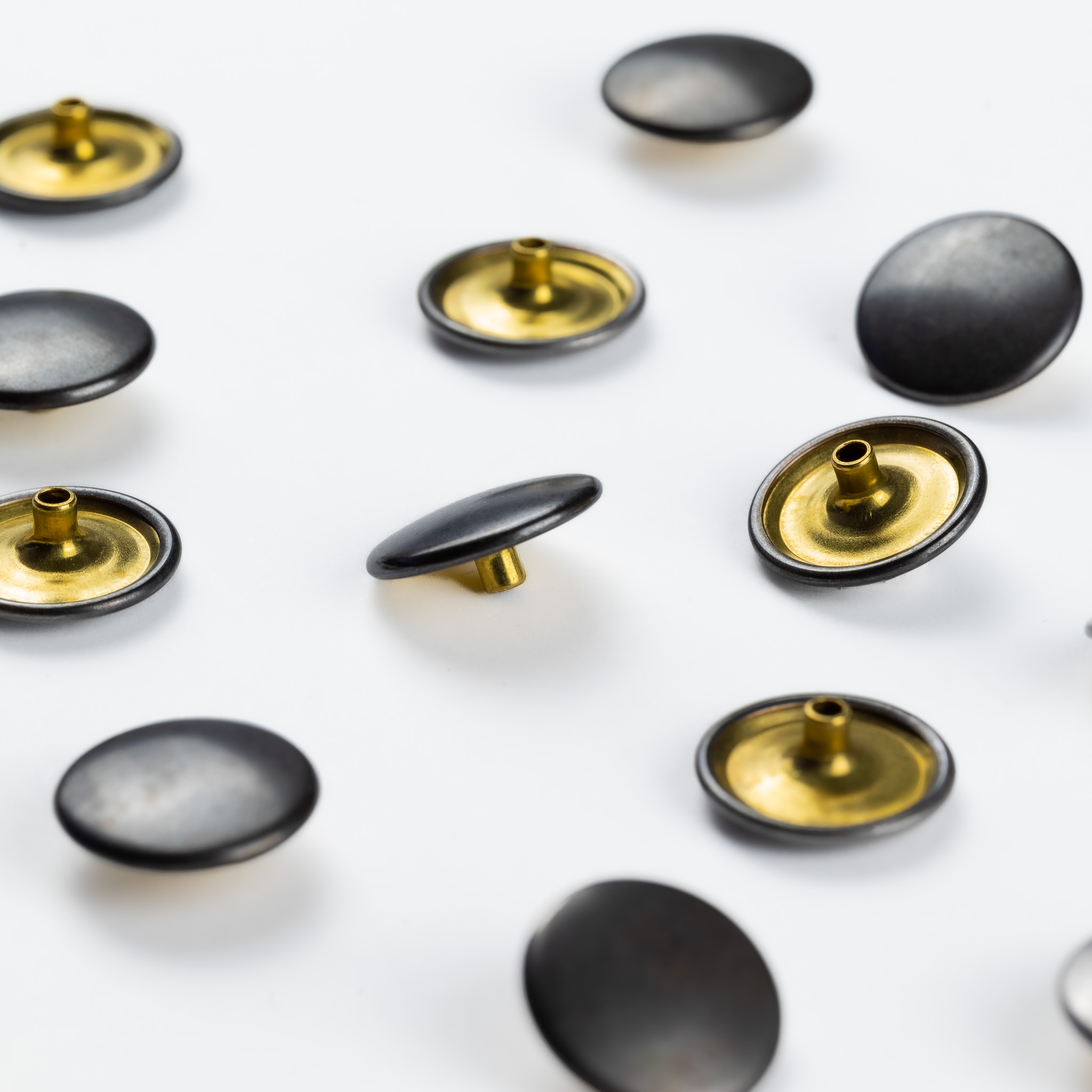 Calotte de bouton pression à ressorts parallèles A1